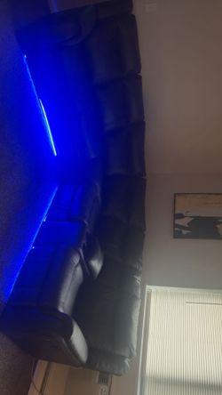 Brown leather recliner with built in lights