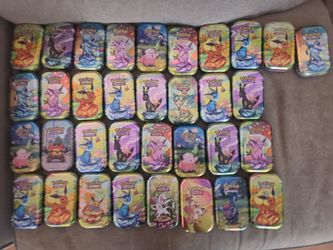 32 empty Pokemon tins