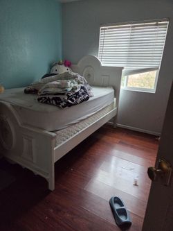 Full size white bed