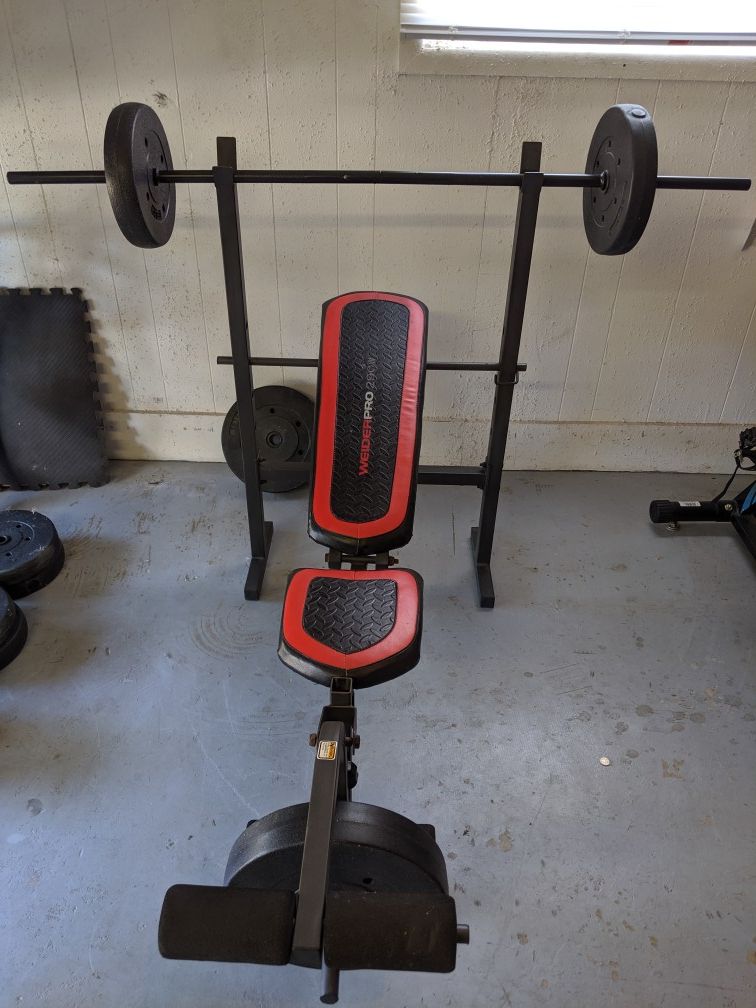 Weider Pro bench with 115lbs weight set