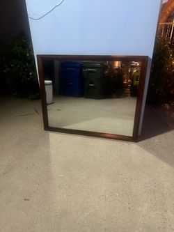 Mirror with wood frame