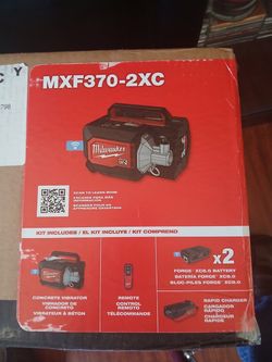 Milwaukee Rx lithium-Lon cordless briefcase concrete vibrator kit with 2 battery and charger