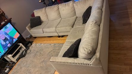 Light Gray Sectional Sofa with Nailhead Trim