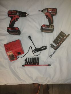 Milwaukee M18 Cordless 2-Tool Combo Kit
 & SAE and MM deep socket set