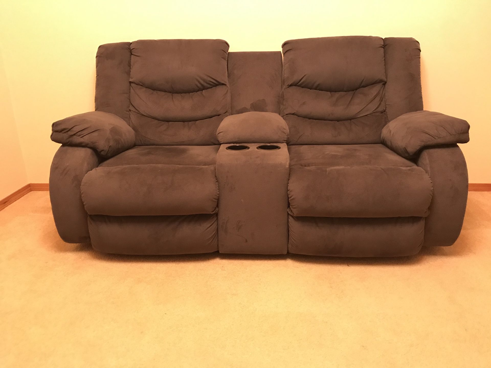 Reclining loveseat with storage console