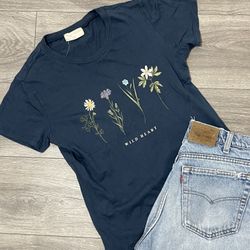 Navy blue graphic floral shirt. B