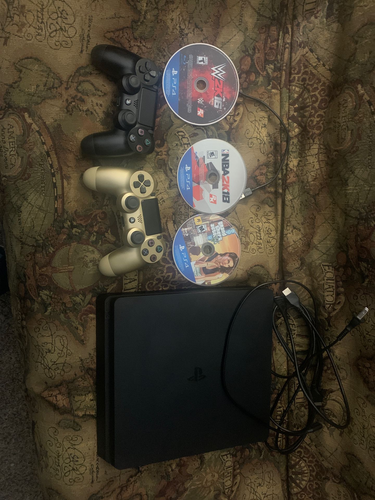 PS4 barley used for it from Costco, 2 controllers and a few games