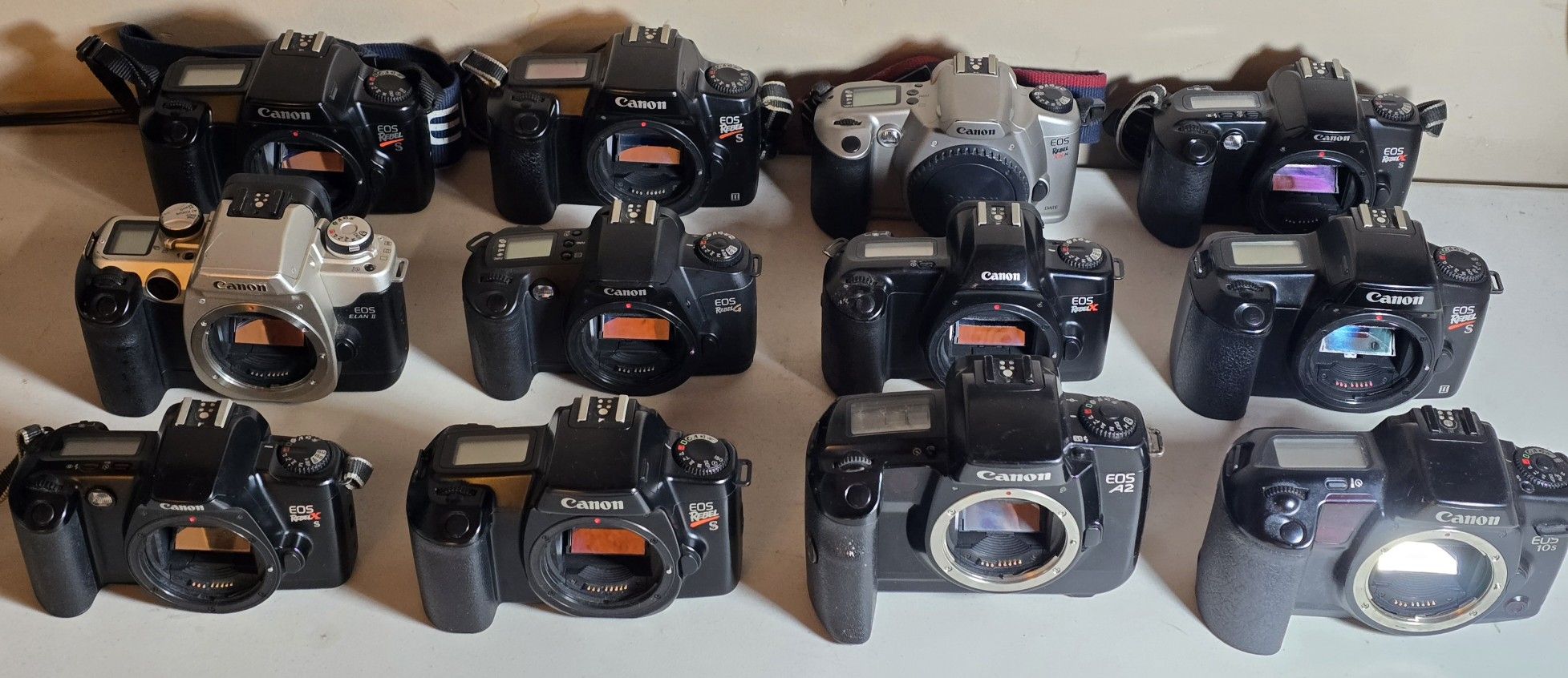 (12) Canon EOS 35mm Camera Bodies - Rebel S, A2, 10s, Elan II, XSn, Rebel X - ALL TESTED & WORKING