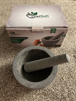 Large mortar and pestle, in box