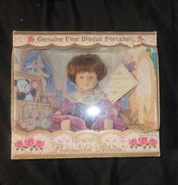 DanDee Poseable Genuine Fine Bisque Porcelain Petites Doll with Floral Dress