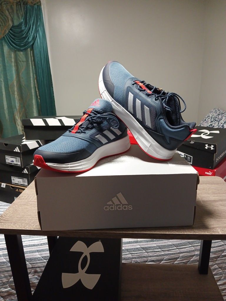 New With Tag Adidas Size 10 Blue and Orange Only $35