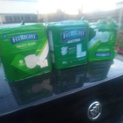 Fitright Optifit Briefs, 2 Large, 1 Medium. One Pack Is Open. For All 3