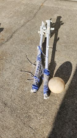 Volleyball net and ball for a pool