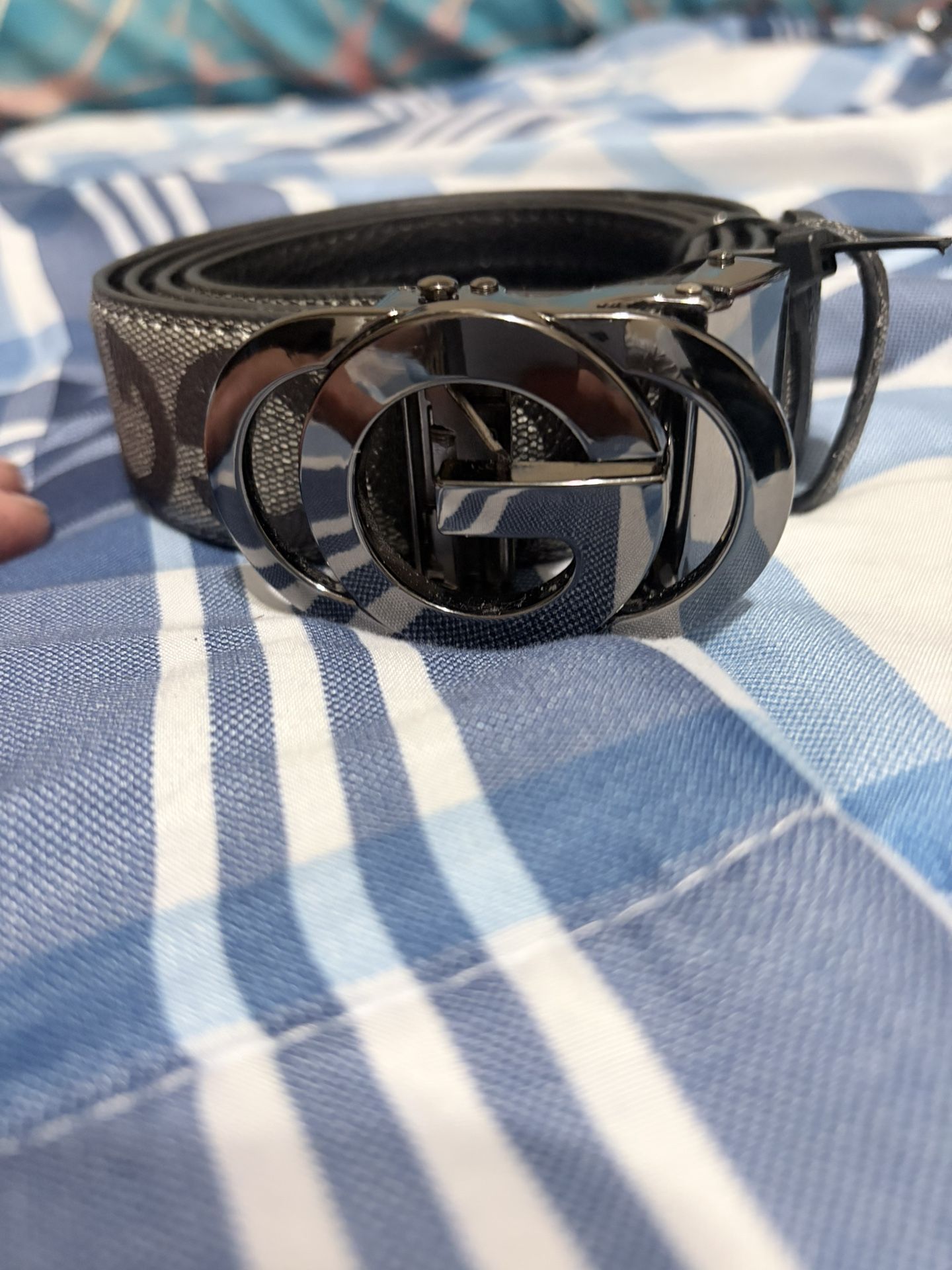 Gucci belt with the Interlocking G buckle.