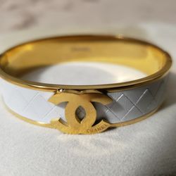 White And Gold Fashion C Bracelet,  Stainless. 1 Available 