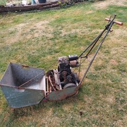 50 60's real lawn mower.