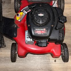 1 Lawnmower Brand Is “yard Machine M” 125cc…..1 Skilsaw Professional 120 Volts….and 1 Black Decker Sander