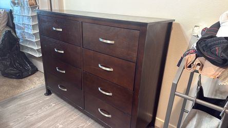 chest of drawers with eight drawers, brown color
