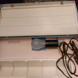 Vintage metal lighted slide sorter. West, east or north