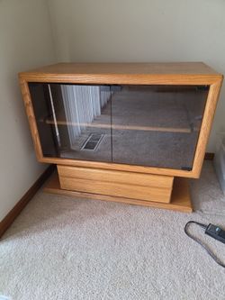 Swivle oak tv stand