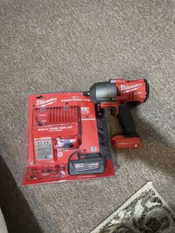 Milwaukee M18 Fuel 1/2 “  High Impact wrench  W One Battery 5.0 And Charger New