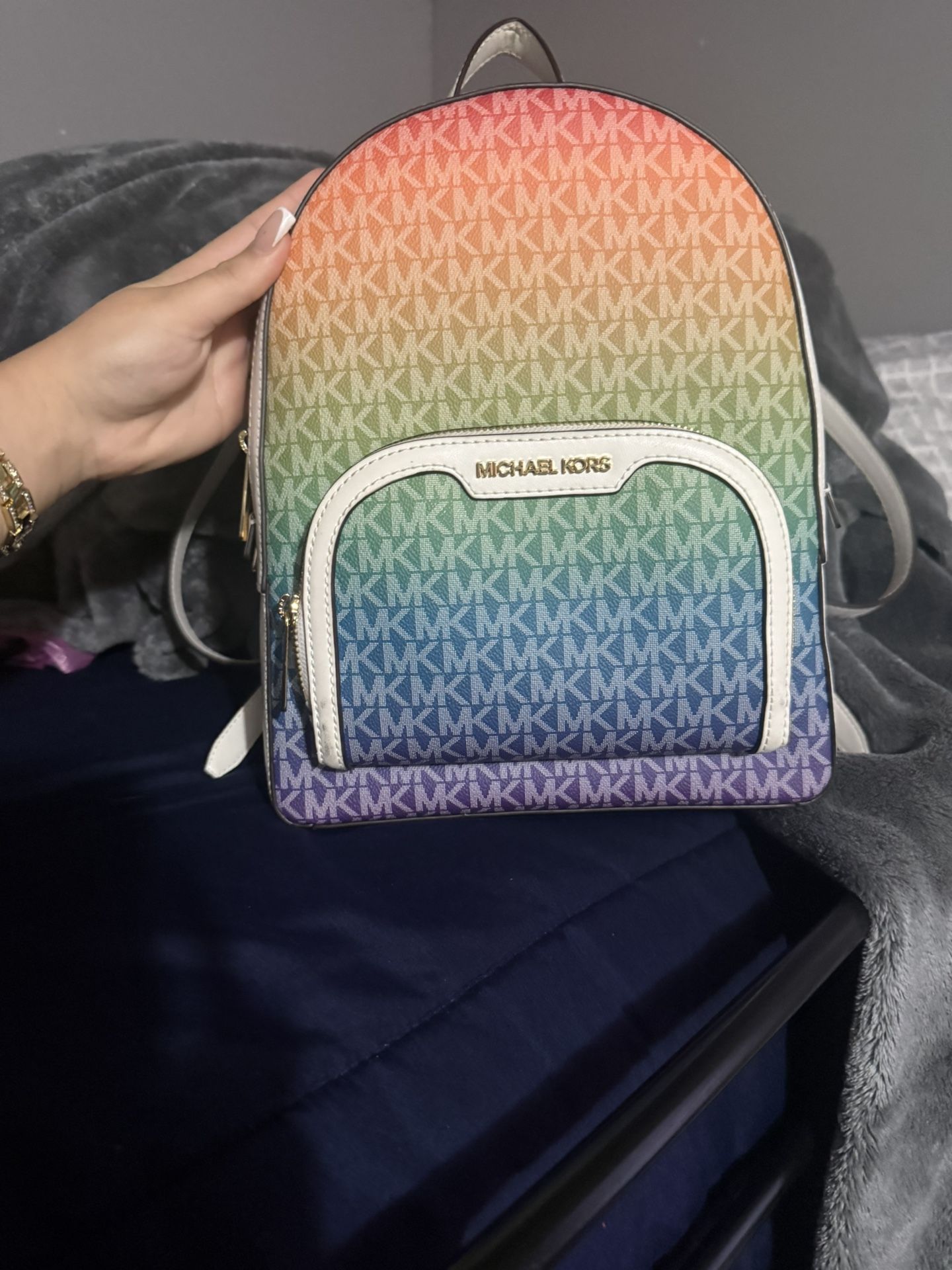 The Michael Kors Jaycee Medium Rainbow Signature Logo Backpack