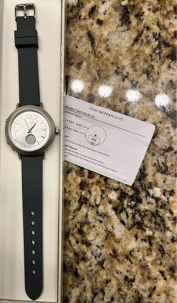 New Isaac Mizahi watch. Original battery pull tab is still in place.