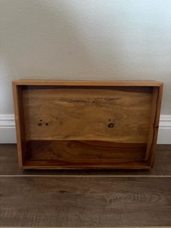 rectangular handmade wooden serving or organizing tray with a natural wood