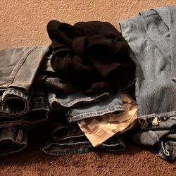 Pile of mens and woman’s pants