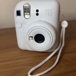 Polaroid Camera (unused, includes film)