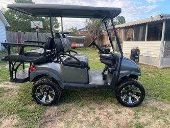 Lifted 4-Passenger Golf Cart Custom Wheels