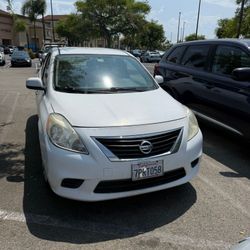 Nissan Versa 2014 128 thousand miles clean title smog has a problem when accelerating a lot it slips it seems like it's the transmission or I don't kn