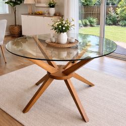 Sleek Glass Top Pedestal Dining Table (47” diameter)