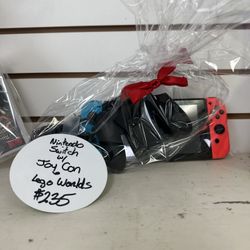 Nintendo Switch With Lego World And Joycon Adapter