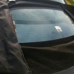 96 To 2006 Black Cloth Sebring Back Window With The Frost Close My Company This Is Old Stock Seems To Be Fine Condition