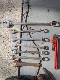 Big wrenches, chipping hammer attachments, and wood drill bits