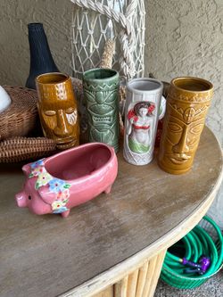 Group of tiki mugs