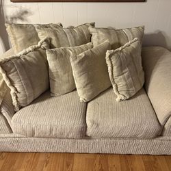 Dinette And Living Room With Tables And Lamp