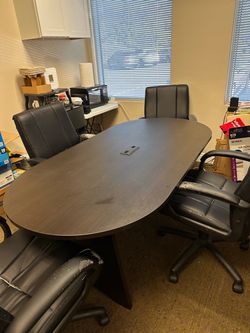 Oval solid wood conference table with 4 chairs