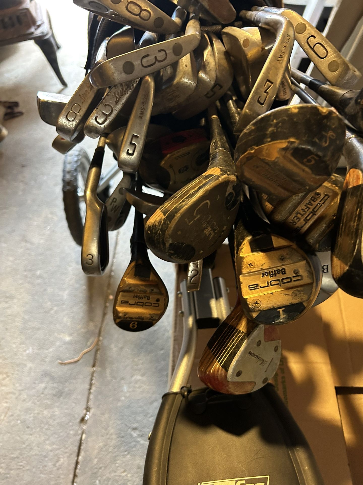 Golf Bag , Carrier And Many Different Size Of Sticks And A Few Balls All For Sale