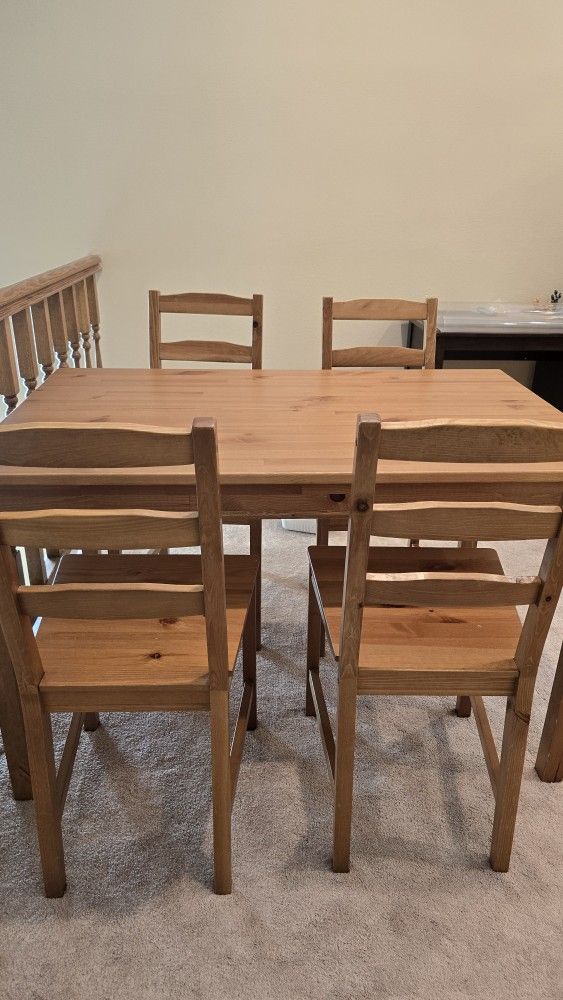 Dining Table And Four Chairs