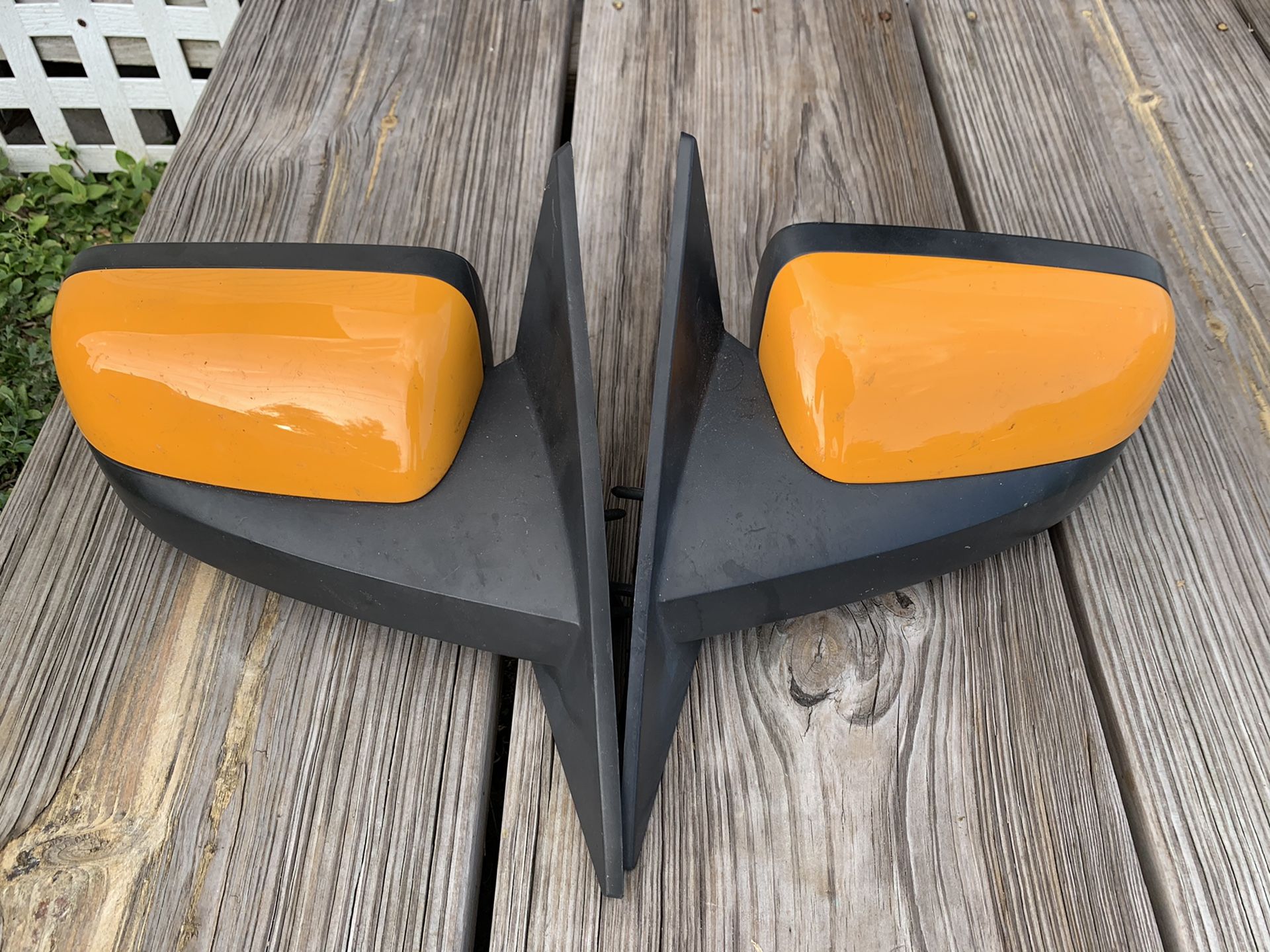 S197 Mustang Grabber Orange mirror covers headlight splitters.
