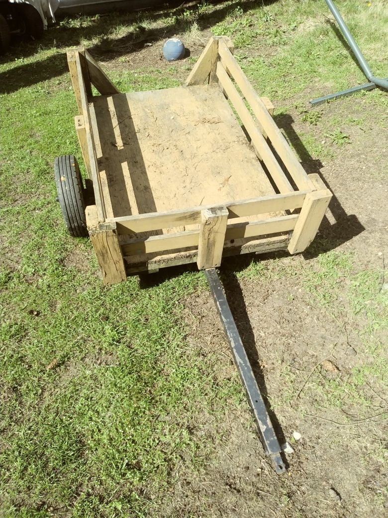 Riding mower trailer.