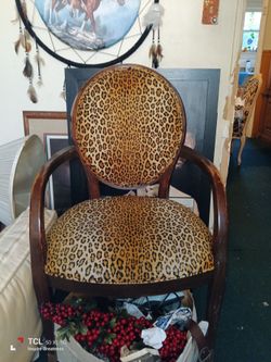 Leopard print vintage chairs solid
