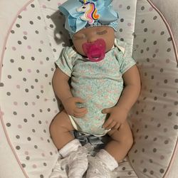 Soft silicone baby girl that comes with ETC