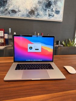 MacBook Pro 15" 2017 Touch Bar - 2.9GHz i7, 16GB RAM, 1TB SSD + Charger & Magic Mouse