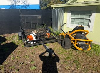 Cub Cadet ZT1 Zero-Turn Mower with Trailer