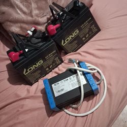 2 baterías and charger for titan x23  wellsher