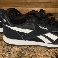 Unisex black and white Reebok Classic Nylon sneaker with suede overlays and a high-abrasion rubber outsole