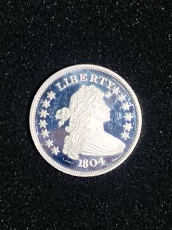 2oz silver with serial number on rim